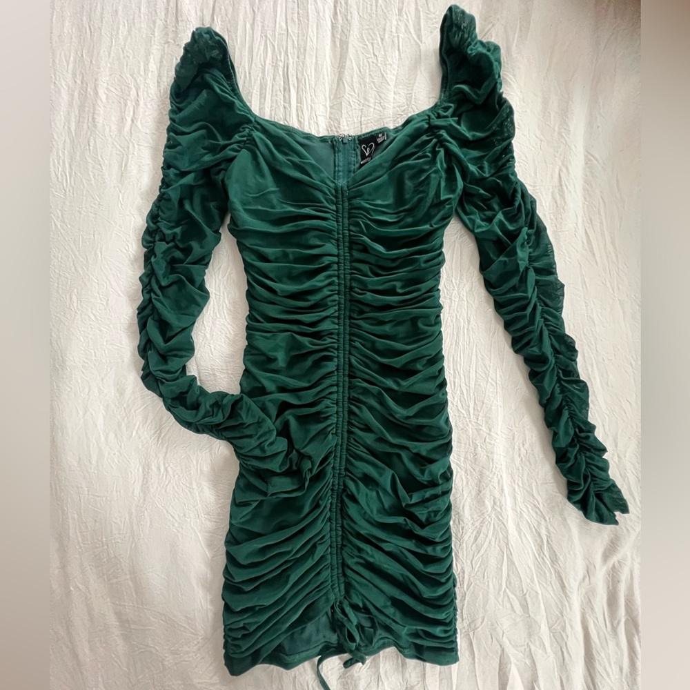 Green ruffle cocktaik dress